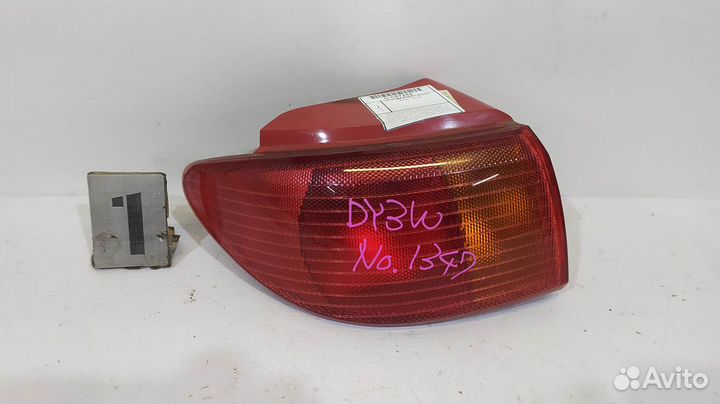 Фонарь задний mazda P1977 L Demio DY 02-04