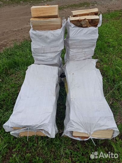 Дрова березовые колотые в мешках и кубами