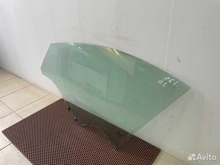 Стекло двери переднее левое Renault Logan
