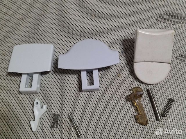 Ручка (рычаг)открывания люка стиральной машины