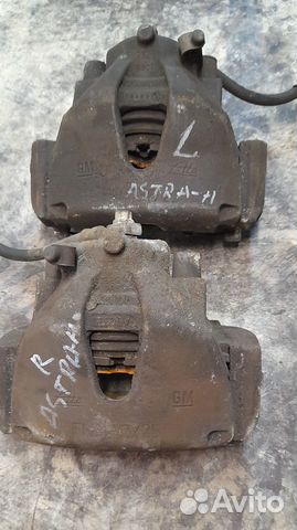 Суппорт тормозной передний Opel Astra H