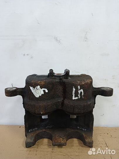 Суппорт тормозной передний Ssangyong Actyon Sports