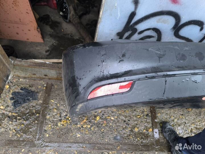 Задний бампер priora 2 в сборе седан черный