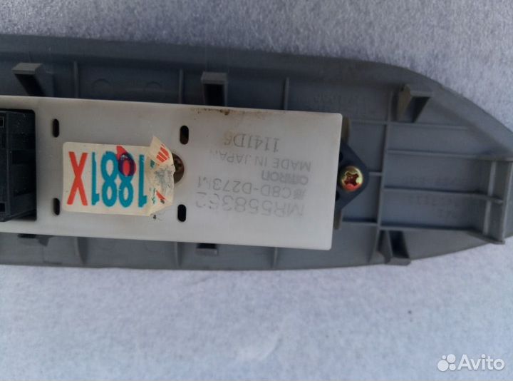 Кнопка стеклоподъемника левая Лансер Цедиа