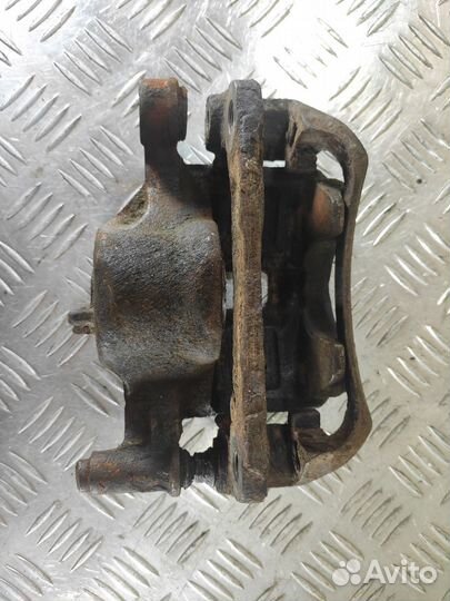 Суппорт передний левый Hyundai Accent 1994-2000