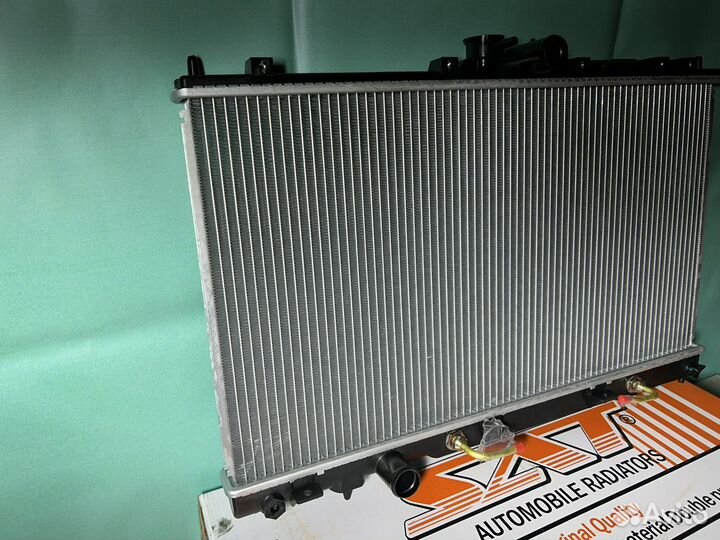 Радиатор двигателя Mitsubishi Lancer 9 (03-11) А/Т