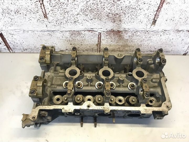 Головка блока цилиндров левая Ford Maverick 3.0L