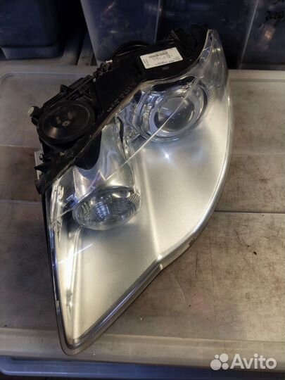 Фара ксенон адаптив б/у левая VW Туарег GP