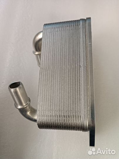 Радиатор масляный Geely Atlas