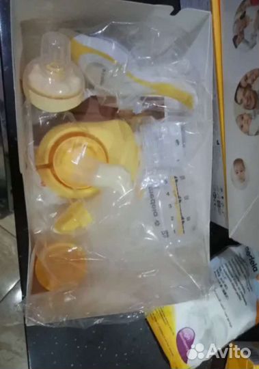 Молокоотсос medela ручной