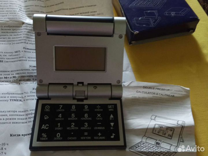 Часы будильник с калькулятором