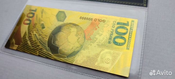 Сувенирная золотая банкнота уефа в России