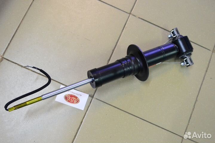 Амортизатор передний Cadillac Escalade 4 с 2015-19