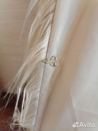 Жилетки меховые женские