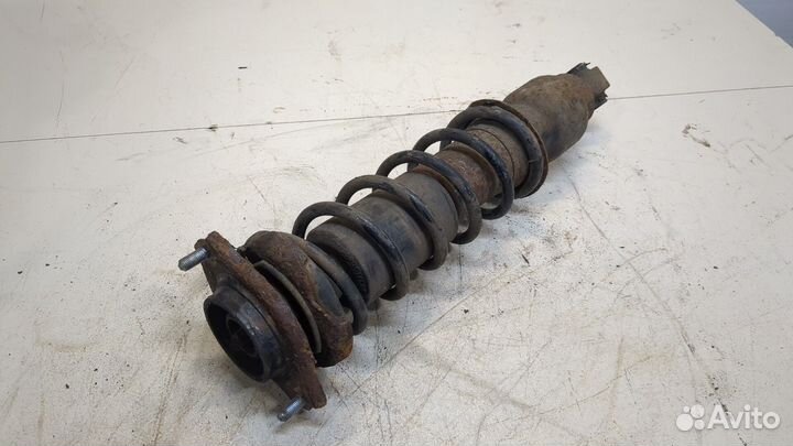 Амортизатор подвески левый задний Subaru Forester (S12)