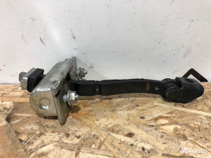 Ограничитель двери передний правый Opel Corsa D