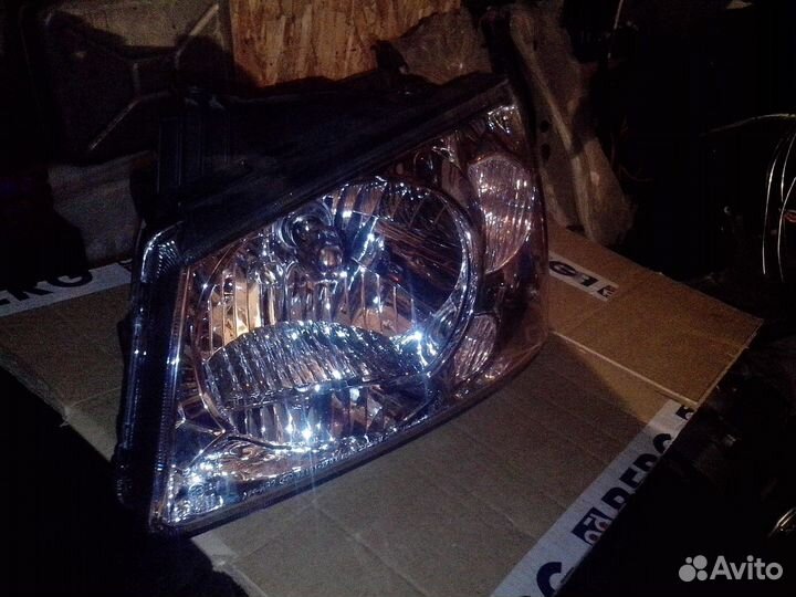 Фара левая для Kia Cerato 04-06 для амер. рынка