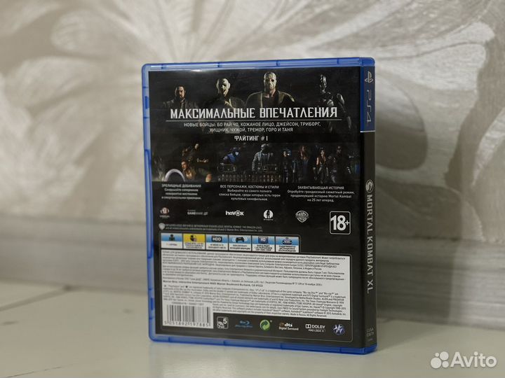 Диск с игрой на PlayStation Mortal Kombat XL