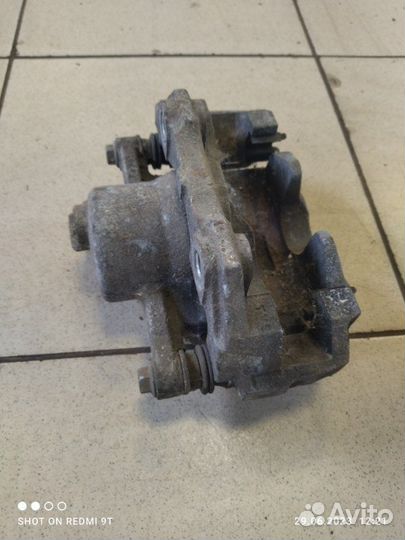 Суппорт тормозной передний правый Volkswagen Polo