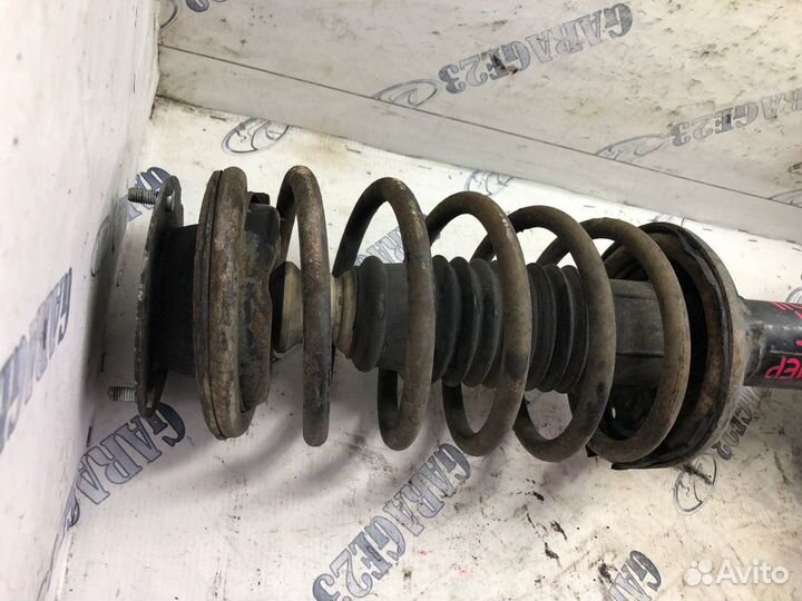 Стойка амортизатора bmw e 34 передняя левая