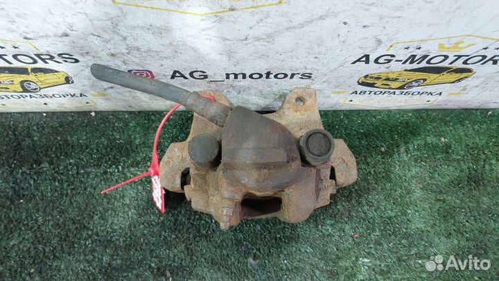 Суппорт тормозной задний левый BMW E34