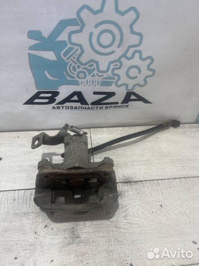 Суппорт задний левый Kia Cerato 3