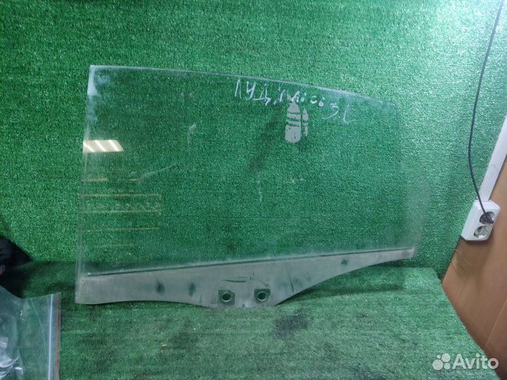 Стекло двери заднее левое Audi A6 C6