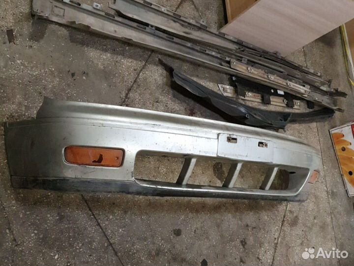 Бампер передний Ниссан Блюберд 1994 г