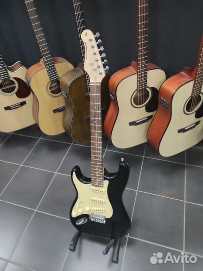 Электрогитара леворукая