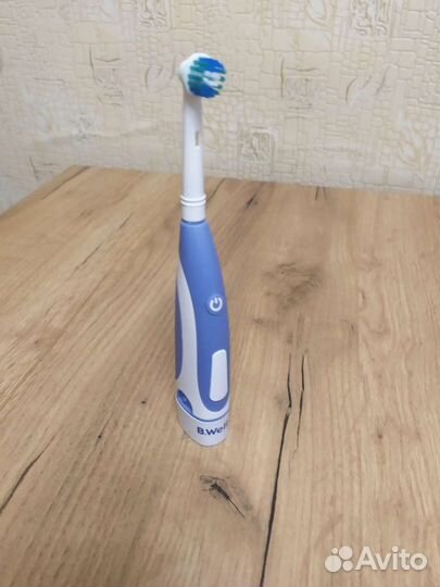 Электронная зубная щетка