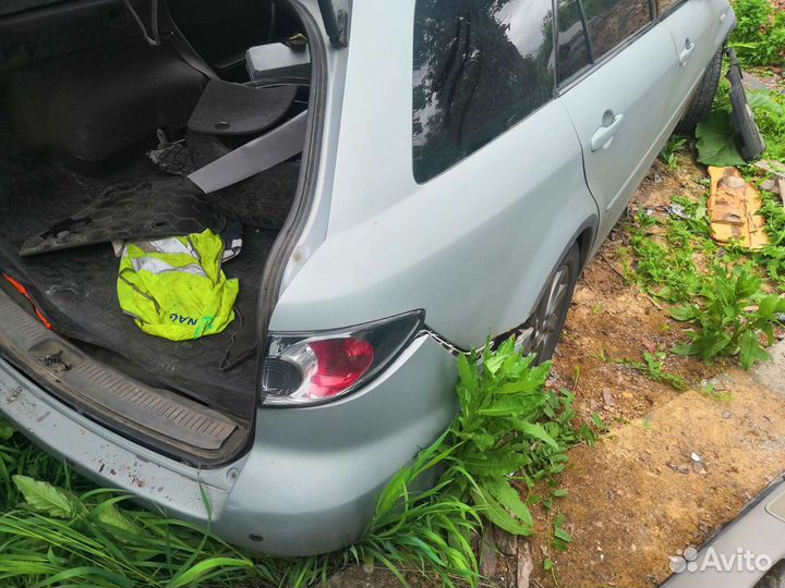 Фонарь задний правый наружний mazda6 универсал