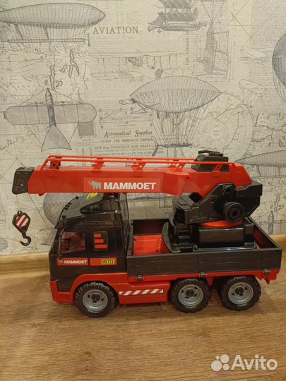 Машина кран