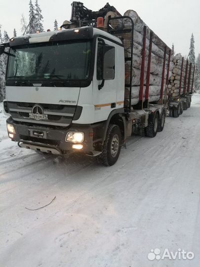Лесовоз с манипулятором сортиментовоз