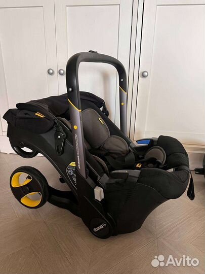 Коляска автокресло doona с базой isofix