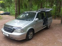 Kia Carnival 2.5 AT, 2005, 150 000 км, с пробегом, цена 479 000 руб.