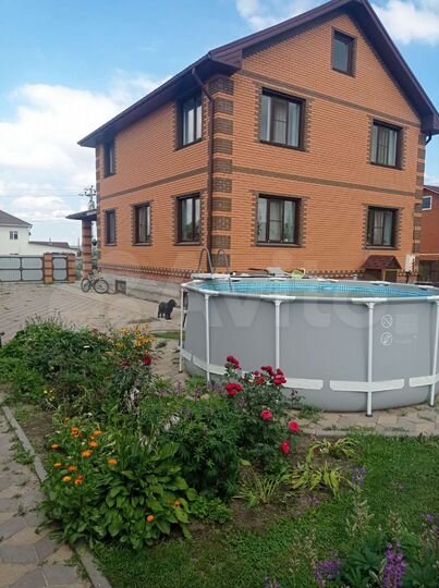 Коттедж 256 м² на участке 15 сот.