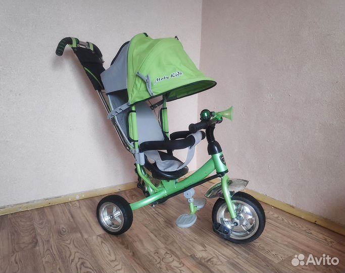 Детский трехколесный велосипед с ручкой moby kids
