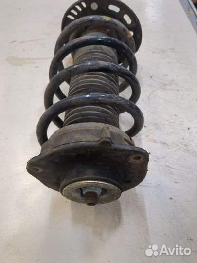 Амортизатор подвески левый передний Volkswagen Passat 7 Европа, 2012