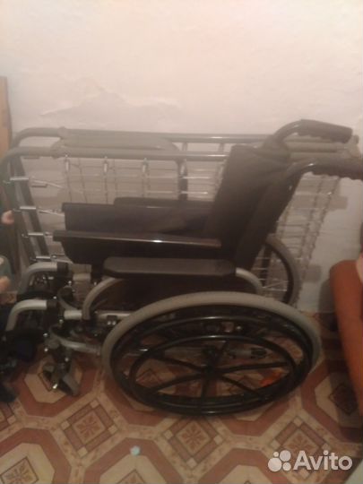 Инвалидная коляска