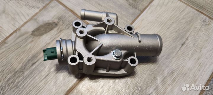 Термостат корпус Citroen Peugeot 1336Z0