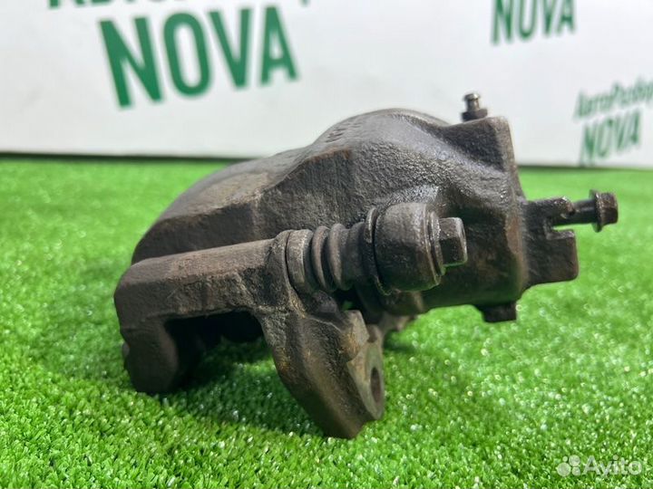 Суппорт тормозной передний правый Nissan Almera