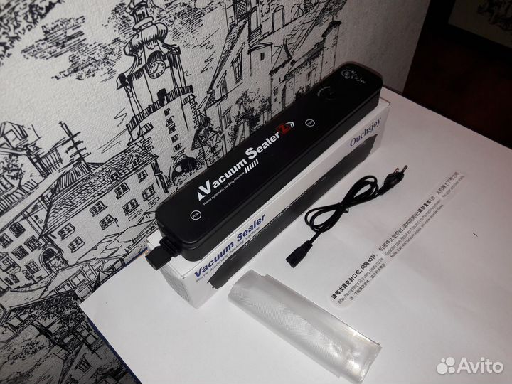 Вакуумный упаковщик