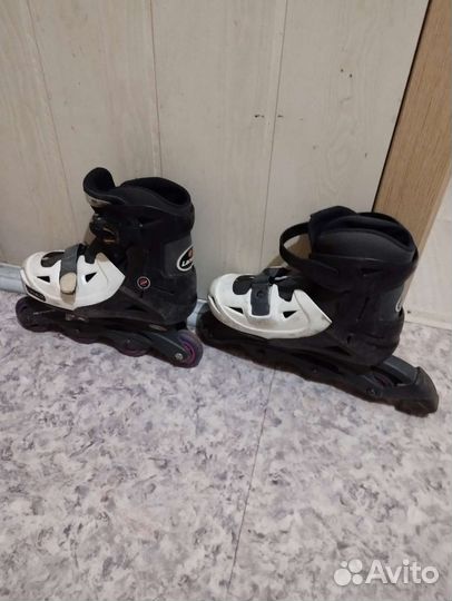 Роликовые коньки