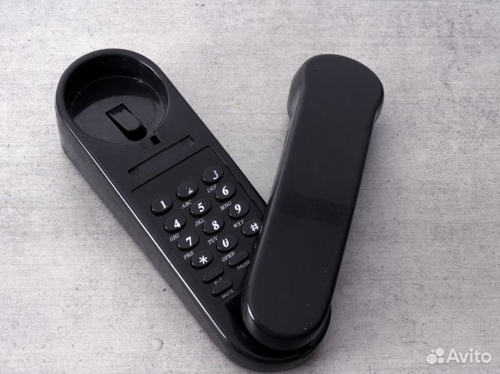 Стационарный телефон с кнопками на детали