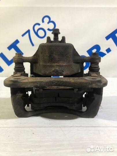 Суппорт передний левый KIA RIO 3 1.6 ат седан