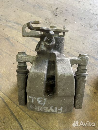 Суппорт задний правый/левый Renault Fluence