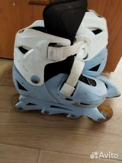 Роликовые коньки
