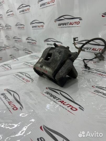 Суппорт тормозной передний правый Kia Sportage 4