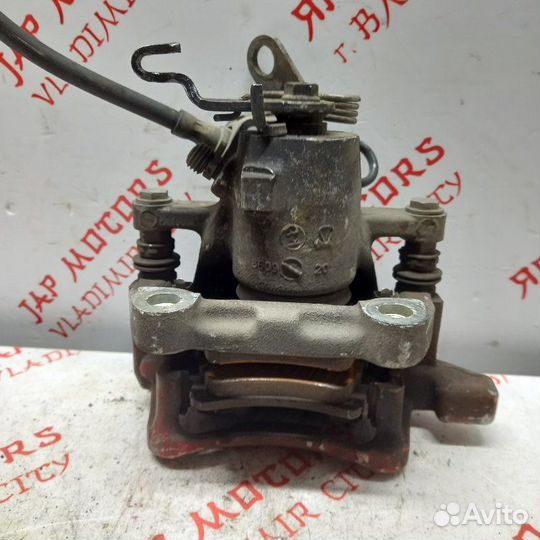 Суппорт тормозной задний левый Volkswagen Golf 5