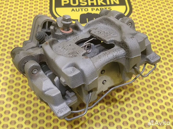 Суппорт тормозной задний правый Volkswagen Jetta